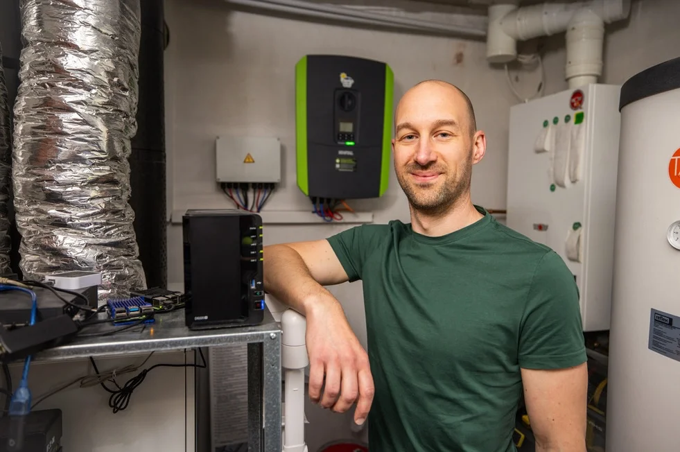 Arne in his utility room with Kostal inverter and evcc on Raspberry Pi