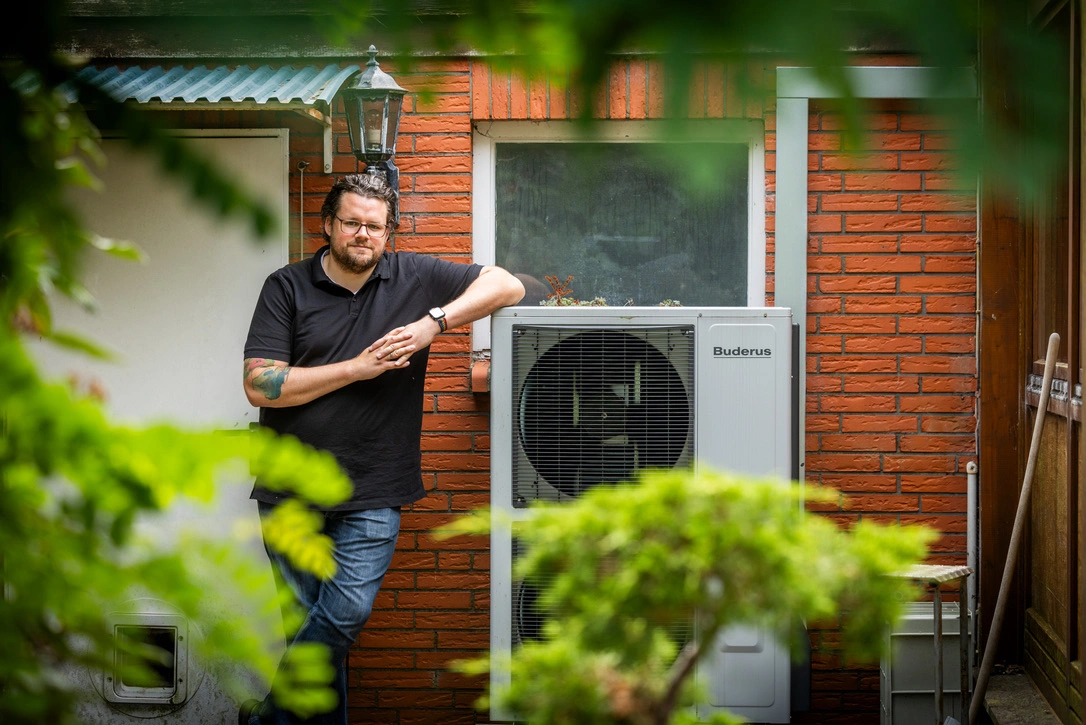 Bastian next to the heat pump