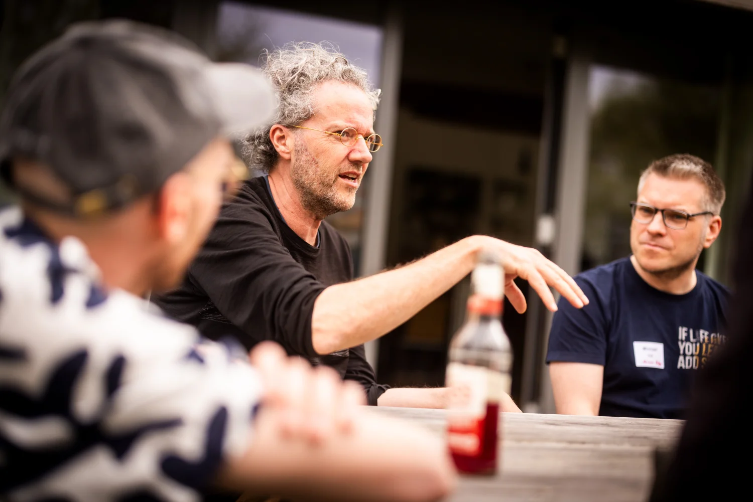 Conversation outside during the wrap-up