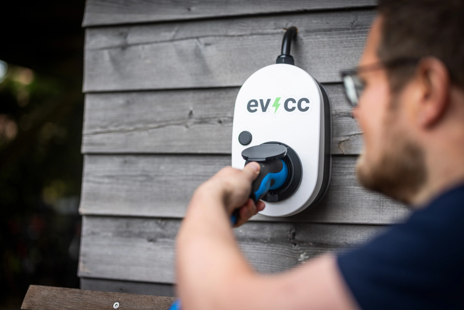 Michael plugging connector into Go-e wallbox