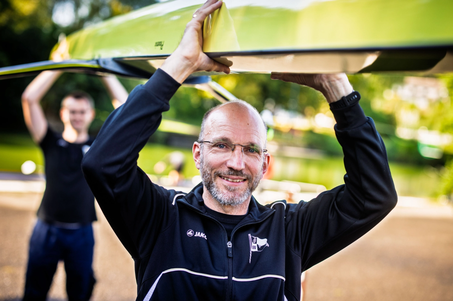 Michael and Markus carrying rowing boat